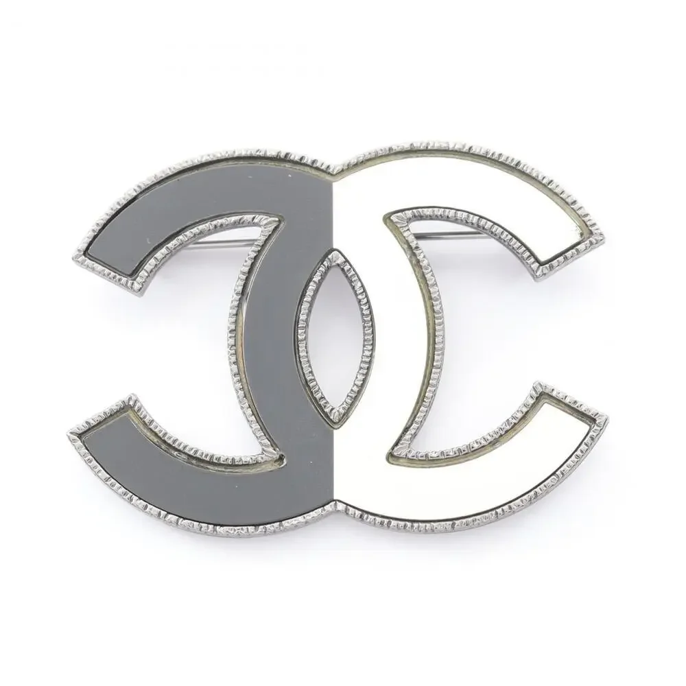 CHANEL Black Logo Brooch